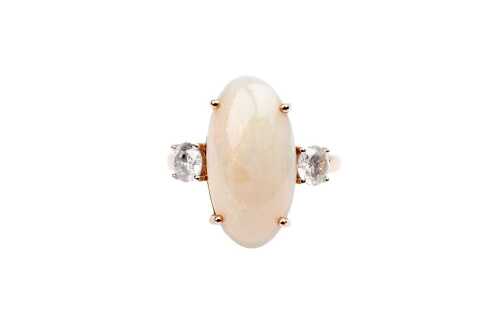 An Andamooka opal and diamond ring in 14 carat rose gold