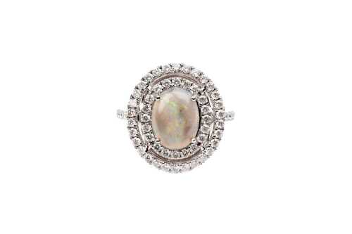 A Lightening ridge opal and diamond ring in 14 carat white gold