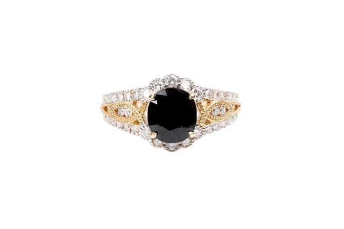 A sapphire and diamond ring in 14 carat yellow gold