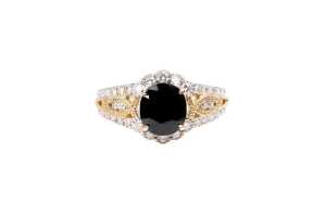 A sapphire and diamond ring in 14 carat yellow gold