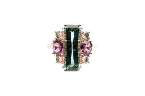 A green, purple tourmaline and diamond ring in 9 carat rose gold