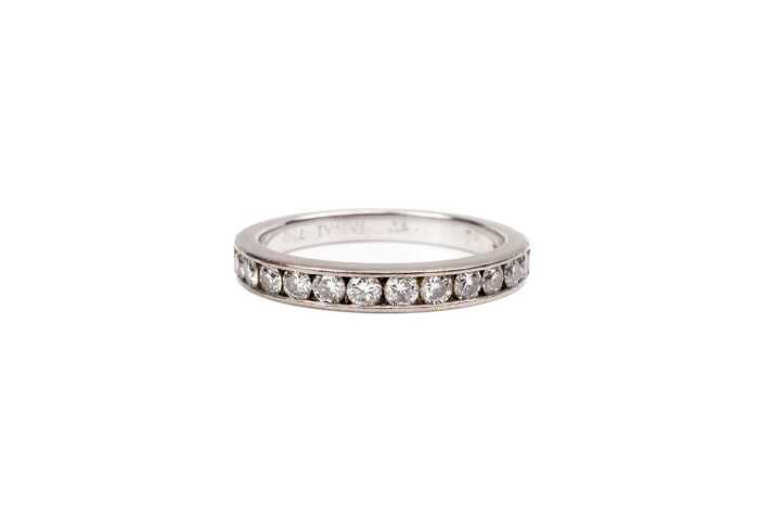 A diamond band in 18 carat white gold
