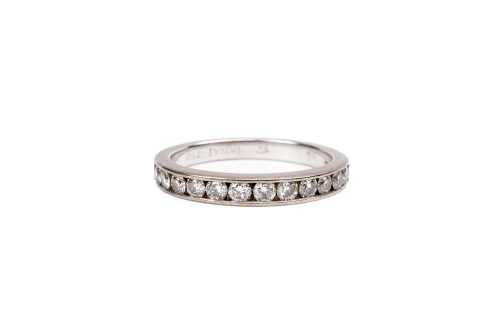 A diamond band in 18 carat white gold