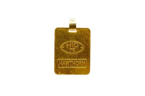 A .998 gold Hawthorn medallion with an 18 carat bale.