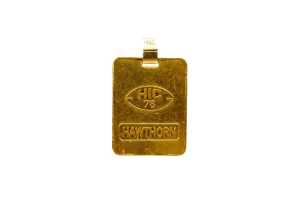 A .998 gold Hawthorn medallion with an 18 carat bale.