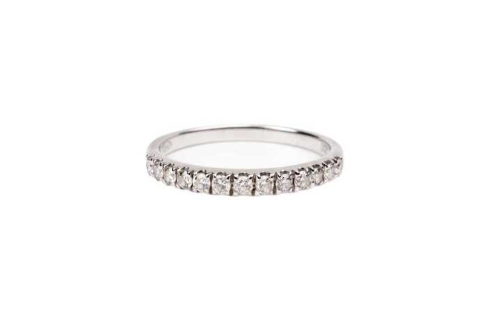 A diamond band in 18 carat white gold