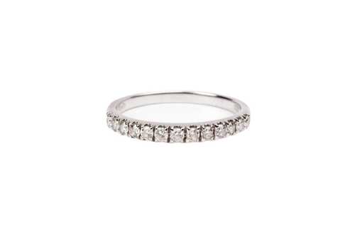 A diamond band in 18 carat white gold