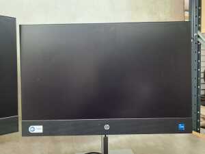 HP ProOne 440 All-in-One desktop computer with an additional monitor, mouse, and keyboard - 3
