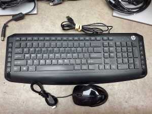 HP ProOne 440 All-in-One desktop computer with an additional monitor, mouse, and keyboard - 5