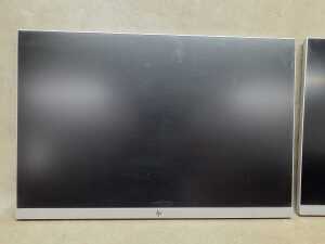 A pair of HP E243i Monitors with adjustable arm unit - 2