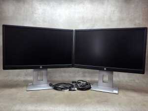A pair of HP E240 monitors,