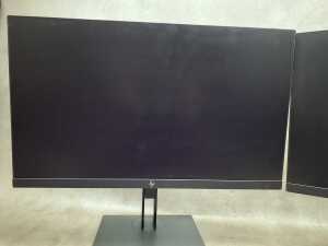 A pair of HP Z-Book Z-24 monitors - 2