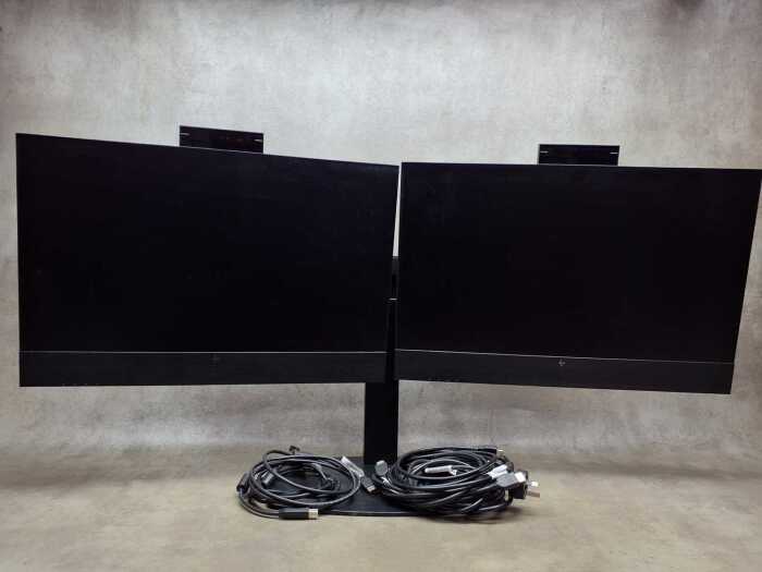 A pair of HP E24 monitors with built in pop up cameras, on stand