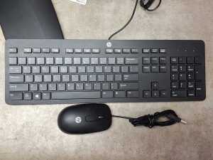 HP Pro Book laptop plus keyboard, two ASUS monitors, mouse and cables - 2