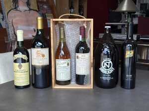 Six bottles of assorted wines and beer including The Premier's 1992 chardonnay and cabernet shiraz in presentation box