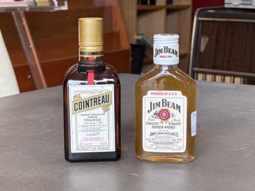 Two spirits bottles including Cointreau