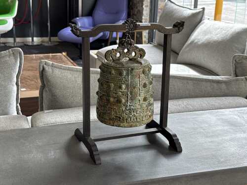 Chinese metal ritual bell mounted on timber display stand