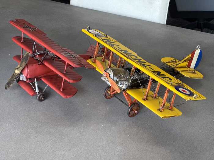 Two metal decorative plane ornaments