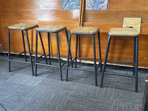 Set of four industrial-style low stools