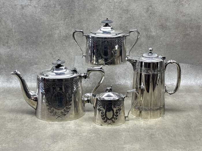 Victorian silver plated tea service including teapot, hot water pot, sugar bowl and creamer