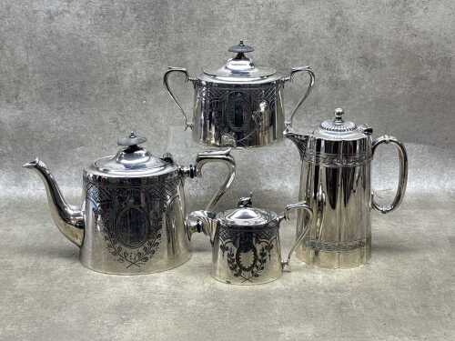 Victorian silver plated tea service including teapot, hot water pot, sugar bowl and creamer