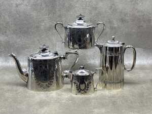 Victorian silver plated tea service including teapot, hot water pot, sugar bowl and creamer