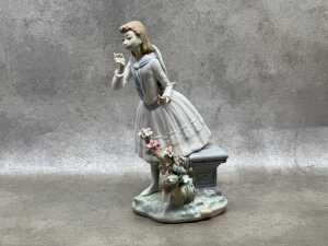 Lladro porcelain figure of a girl in a garden