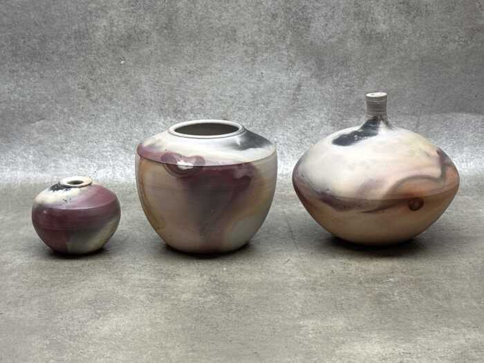 Three studio pottery vases.