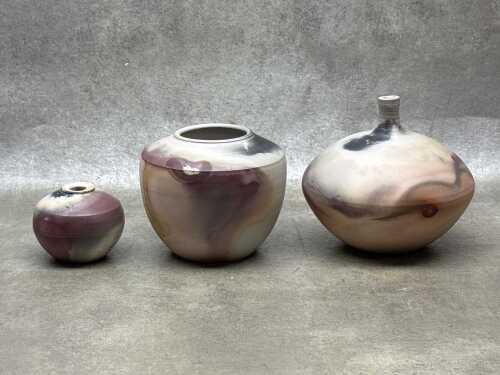 Three studio pottery vases.