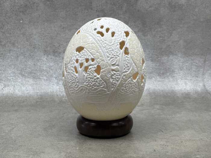 Hand-carved ostrich egg with giraffe decoration
