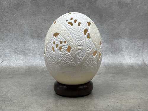 Hand-carved ostrich egg with giraffe decoration