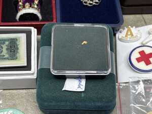 A tin of badges, medallions, and a tiny gold nugget - 6