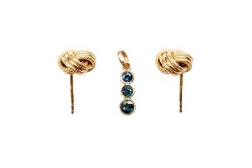 A pair of knot stud earrings and a sapphire pendant in 9 carat yellow gold