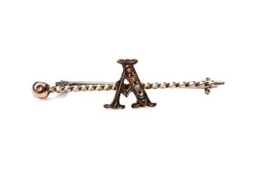 A vintage seed pearl A initial brooch in 9 carat yellow gold