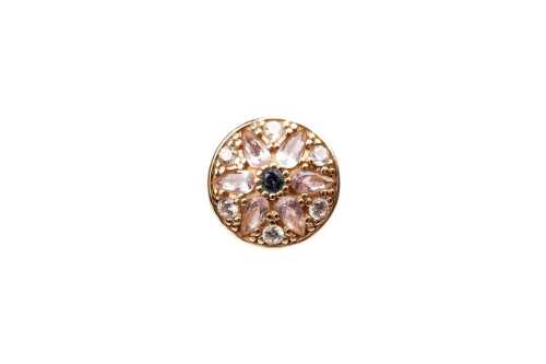 A retired cubic zirconia Pandora charm in 14 carat yellow gold