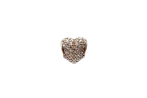 A retired Pandora heart cubic zirconia charm in 14 carat yellow gold
