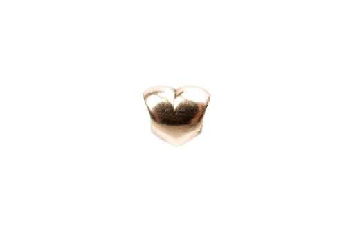 A retired Pandora heart charm in 14 carat yellow gold