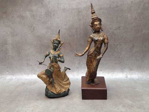 Two Thai cast metal figures with applied gilt decoration.