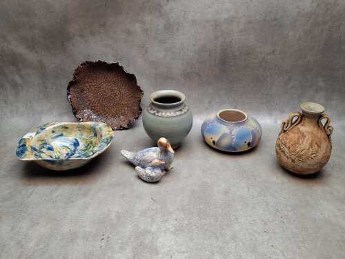 Studio pottery including cockatoo bowl, impressed bowl, ducks figure A/F