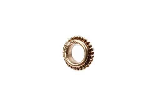 A retired Pandora spacer charm in 14 carat yellow gold