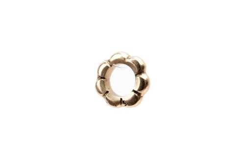 A retired Pandora bubble spacer charm in 14 carat yellow gold