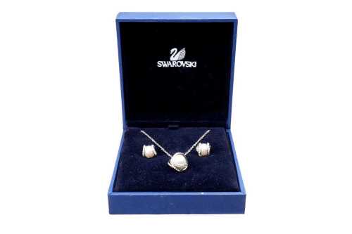 A Swarovski Nude earrings and necklace set