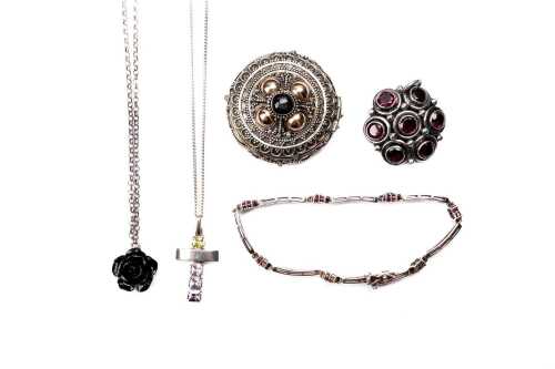 Collection of jewellery and a pill box in sterling silver