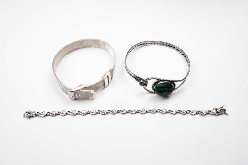 A bangle and two bracelets in sterling silver
