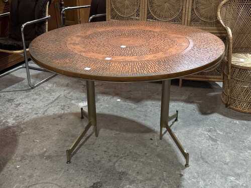 Copper tone dining table
