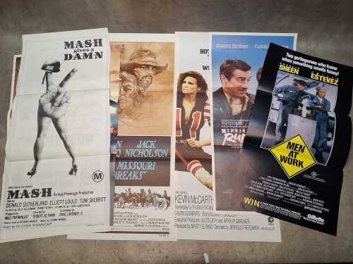 Eight movie posters, including The Karate Kid