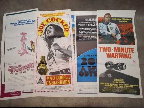 Eight vintage movie posters, including 2001: A Space Odyssey