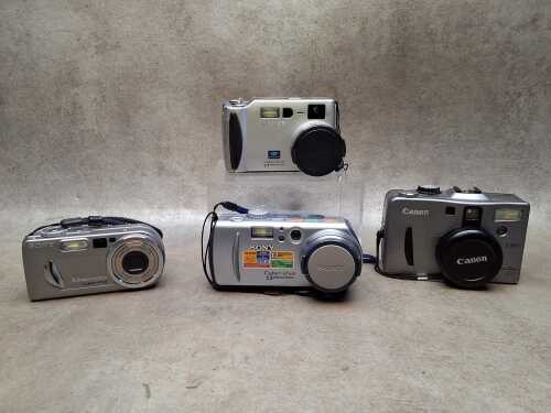 Four point and shoot digital cameras including Sony and Canon