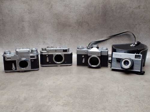 Four vintage Soviet cameras and camera bodies