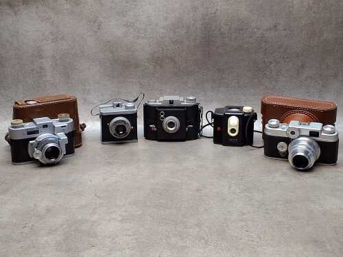 Five vintage American film cameras